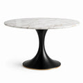 Mesa redonda de mármol y base de metal negro